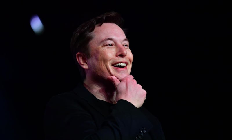Mr. Musk speaks during the unveiling of the new Tesla Model Y. AFP