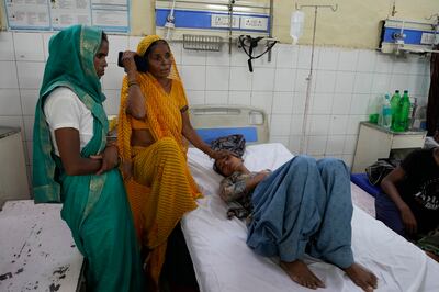 A survivor receives treatment at Hathras District Hospital in Uttar Pradesh on Wednesday, July 3, 2024. AP Photo