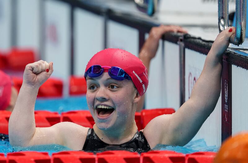 Great Britain's Maisie Summers-Newton celebrates after winning the Women's 200m Individual Medley SM6 Swimming Final during the Tokyo 2020 Paralympic Games in Tokyo, Thursday, Aug.  26, 2021.  (Bob Martin for OIS via AP)