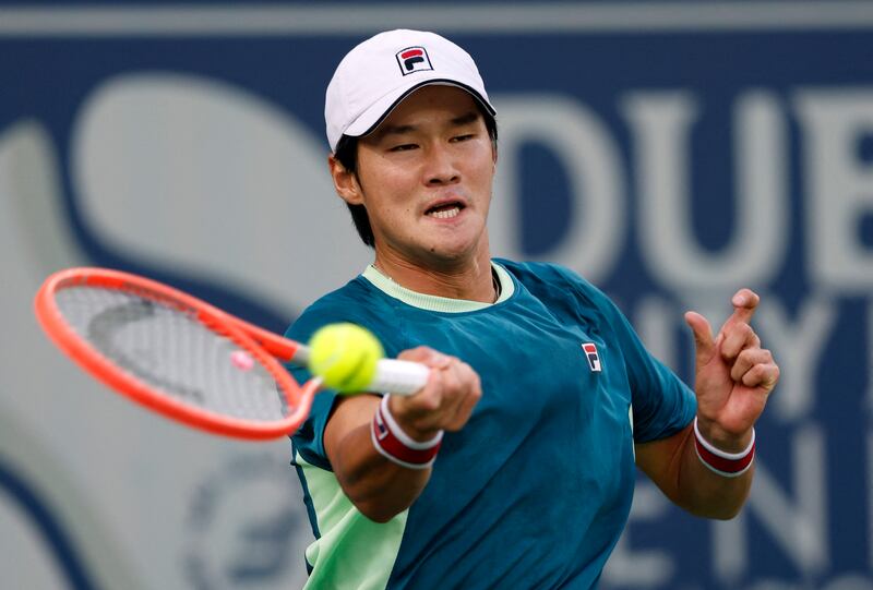 Soonwoo Kwon hits a forehand to Andrey Rublev. Reuters