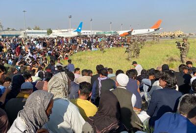 Thousands of Afghans descended on Kabul's airport. AP Photo