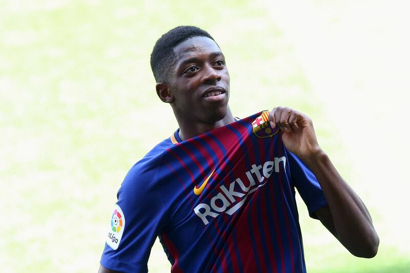 Soccer Football - F.C. Barcelona - Ousmane Dembele Presentation - Barcelona, Spain - August 28, 2017. F.C. Barcelona's new signing Ousmane Dembele shows off club's seal. REUTERS/Albert Gea