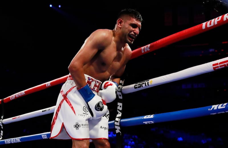 Amir Khan in visible discomfort after a low blow shot from Terence Crawford. Action Images via Reuters/Andrew Couldridge