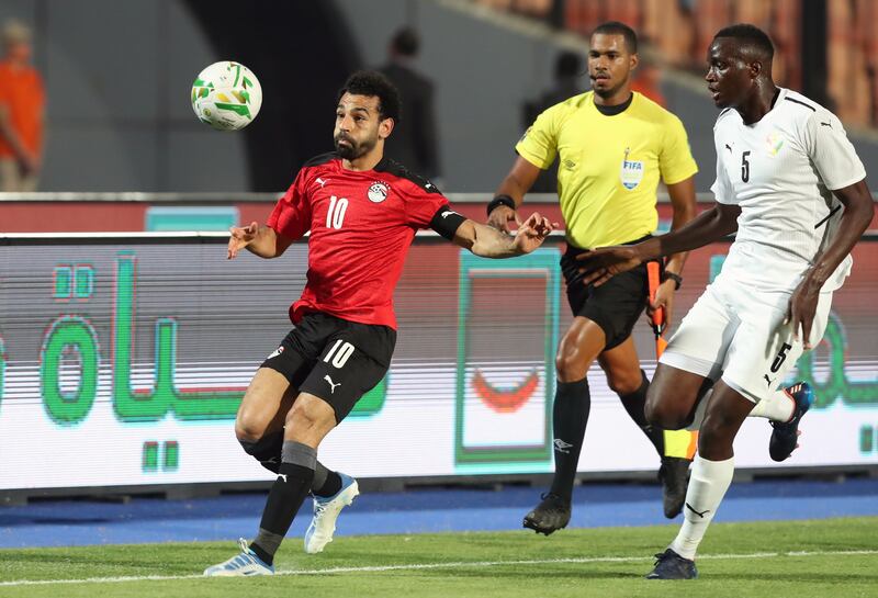 Mohamed Salah in action against Mouctar Diakhaby during the Afcon qualifying match in Cairo. EPA