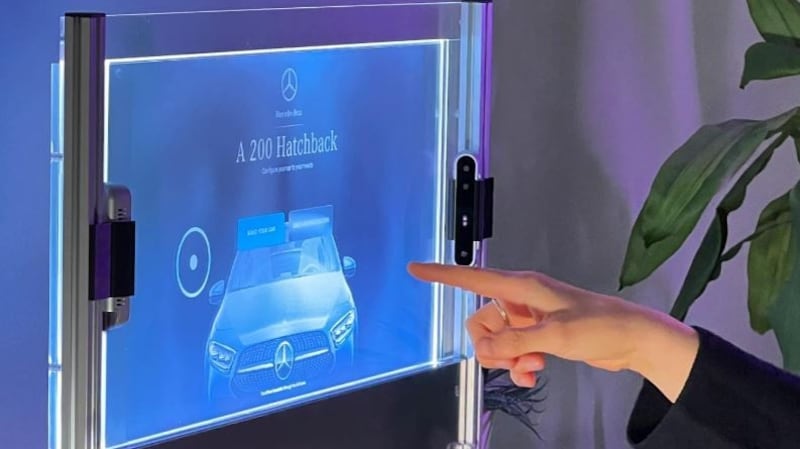 Transparent and gesture controlled signs and screens, like this prototype, could become more prevalent in retail in 2024. (Ameria AG)