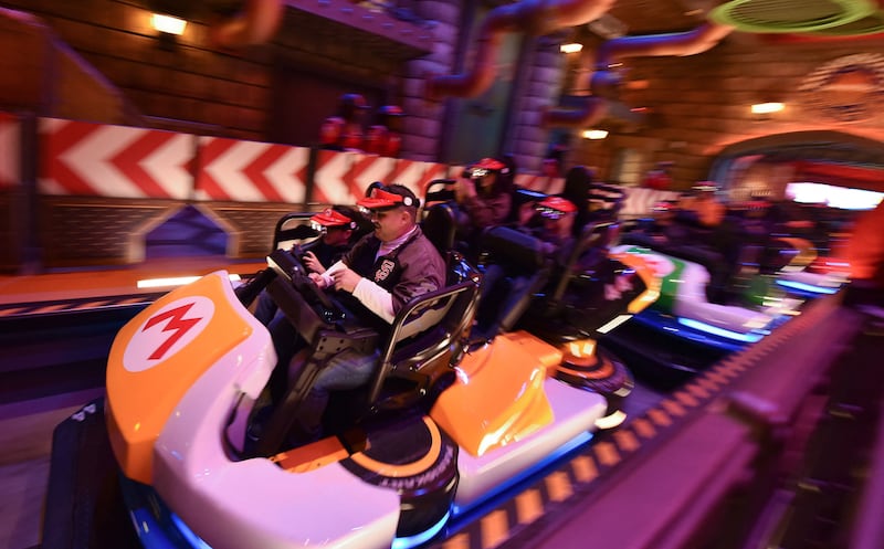 Guests ride Super Mario Kart