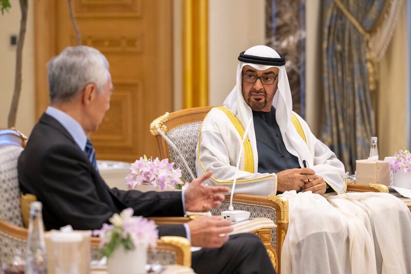 President Sheikh Mohamed with Singapore Prime Minister Lee Hsien Loong, at Qasr Al Watan. Mohamed Al Hammadi / UAE Presidential Court