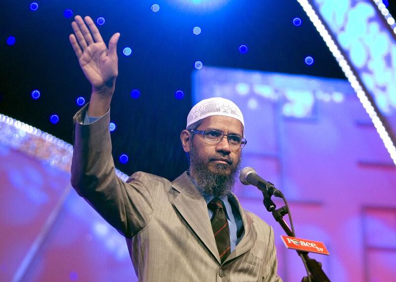 An Islamic tv station, whose founder Zakir Naik is banned from the UK, faces being stripped of its licence in Britain after a watchdog found it repeatedly broadcast hate speeches.   Zakir Naik speaks at the Dubai Airport Expo Centre on August 27, 2009. Jeff Topping / The National