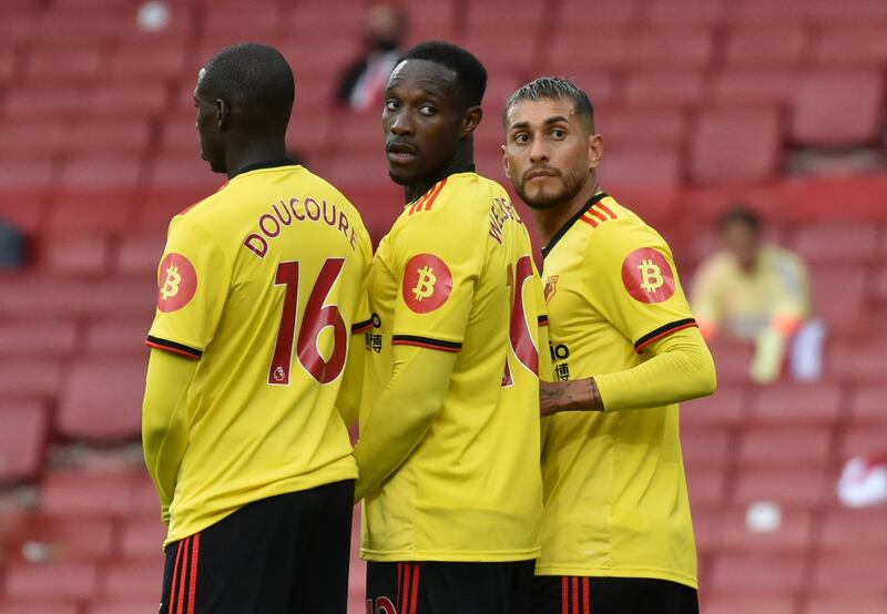 Soccer Football - Premier League - Arsenal v Watford - Emirates Stadium, London, Britain - July 26, 2020  Watford's Abdoulaye Doucoure, Danny Welbeck and Roberto Pereyra line up a wall to defend a free kick, as play resumes behind closed doors following the outbreak of the coronavirus disease (COVID-19) Pool via REUTERS/Rui Vieira EDITORIAL USE ONLY. No use with unauthorized audio, video, data, fixture lists, club/league logos or 'live' services. Online in-match use limited to 75 images, no video emulation. No use in betting, games or single club/league/player publications.  Please contact your account representative for further details.