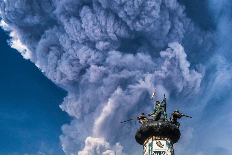 Volcanic ashes from Mount Sinabung as seen from Berastagi, Karo, North Sumatra, Indonesia. Tibta Nangin / EPA