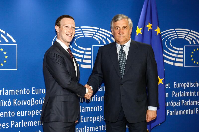 Mark Zuckerberg, chief executive officer and founder of Facebook Inc., left, shakes hands with Antonio Tajani, president of the European Parliament, as he arrives to testify at the European Union (EU) parliament in Brussels, Belgium, on Tuesday, May 22, 2018. Zuckerberg will tout the company's investment in Europe and again take responsibility for privacy failures, according to testimony prepared for an appearance Tuesday in front of the region's parliament. Photographer: Dario Pigantelli/Bloomberg