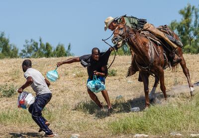US Homeland Security Secretary Alejandro Mayorkas defended his department after images showing horse-mounted immigration officers chasing down Haitian migrants on the border with Mexico went viral. AFP