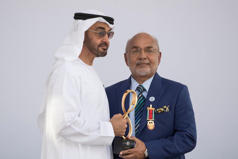 ABU DHABI, UNITED ARAB EMIRATES -  March 12, 2018: HH Sheikh Mohamed bin Zayed Al Nahyan, Crown Prince of Abu Dhabi and Deputy Supreme Commander of the UAE Armed Forces (L), presents an Abu Dhabi Award to George Mathew (R), during the awards ceremony at the Sea Palace.
( Ryan Carter for the Crown Prince Court - Abu Dhabi )
---