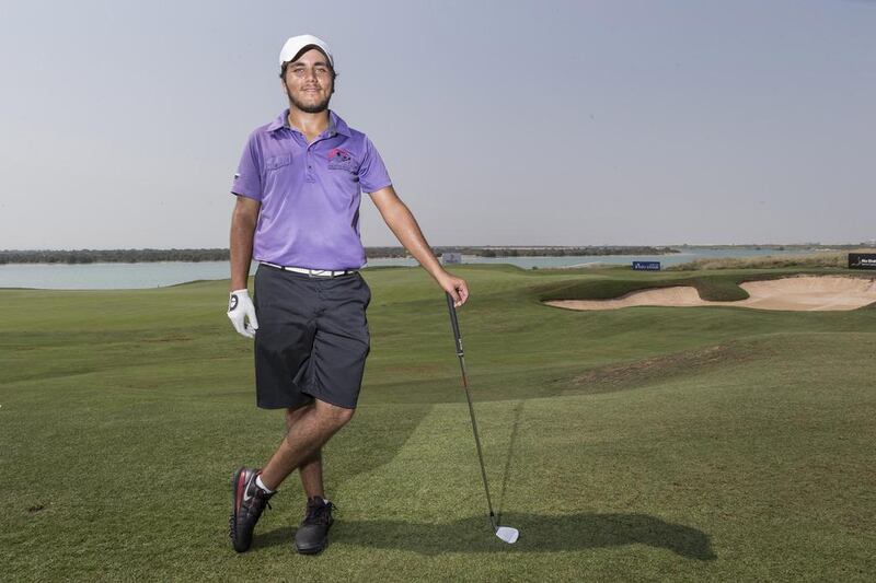 Emirati golfer Ahmed Skaik takes time out during a practice round at the Yas Links Golf Club yesterday. Antonie Robertson / The National

