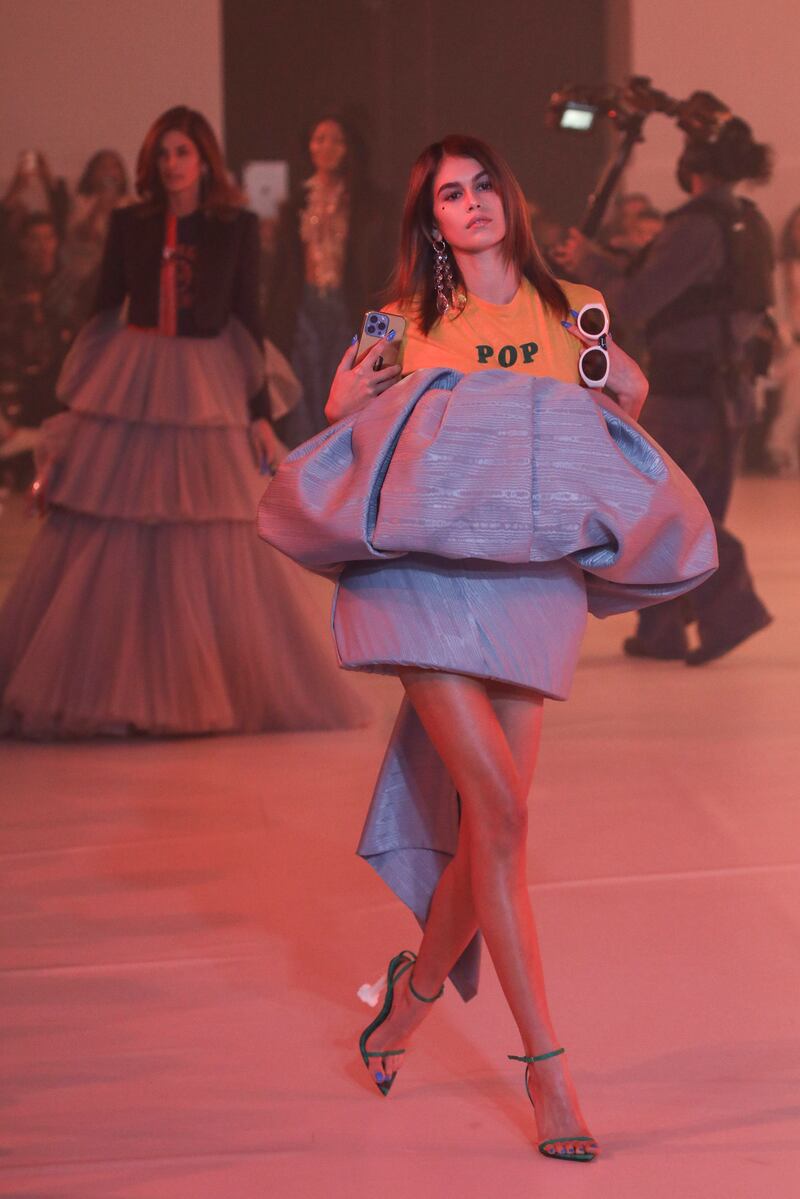 Kaia Gerber wears a creation as part of the Off-White show. AP