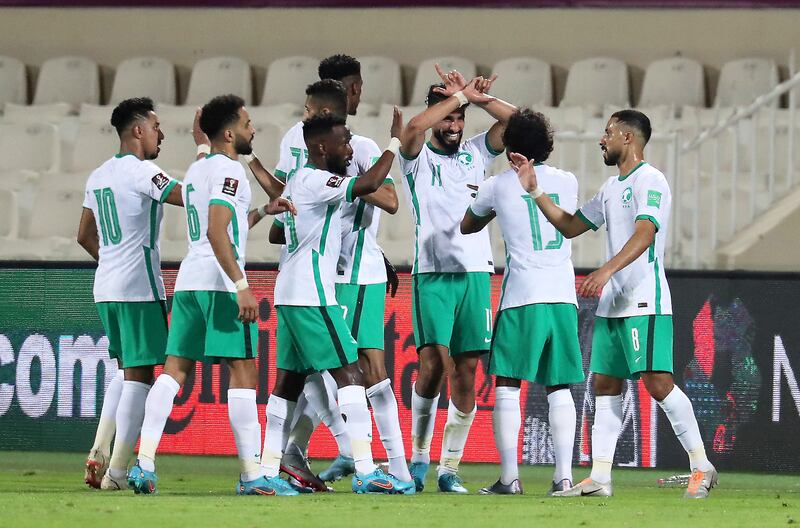 Saleh Khalid Al Shehri celebrates opening the scoring. 