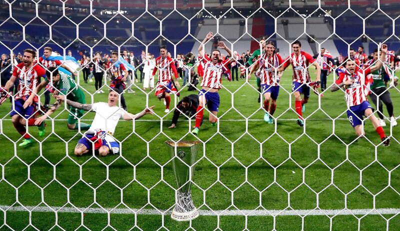 Atletico Madrid's team celebrates after winning the UEFA Europa League final between Olympique Marseille and Atletico Madrid in Lyon, France, on May 16, 2018. Guillaume Horcajuelo / EPA