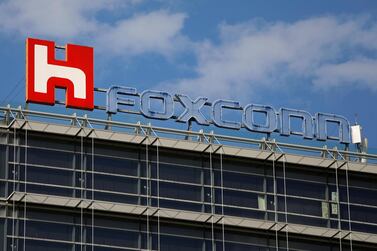 The logo of Foxconn, the trading name of Hon Hai Precision, is seen on top of the company's building in Taipei. Reuters
