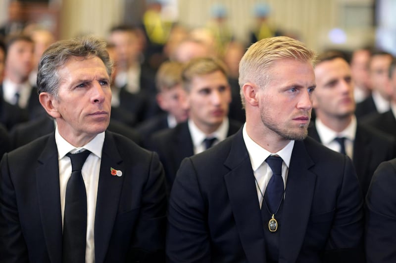 epa07140952 A handout photo made available by King Power shows Leicester City's manager Claude Puel (L) and goalkeeper Kasper Schmeichel (R) attending a funeral rite of the club's late Thai Chairman Vichai Srivaddhanaprabha at Wat Debsirindrawas Ratchaworawiharn Temple in Bangkok, Thailand, 04 November 2018. Thai billionaire owner of Leicester City soccer club and King Power duty free mogul, Vichai Srivaddhanaprabha died along other four people when his personal helicopter has crashed and burst into flames outside King Power Stadium in Leicester, central England after the Premier League soccer match between Leicester City and West Ham United on 27 October 2018.  EPA/KING POWER HANDOUT  HANDOUT EDITORIAL USE ONLY/NO SALES