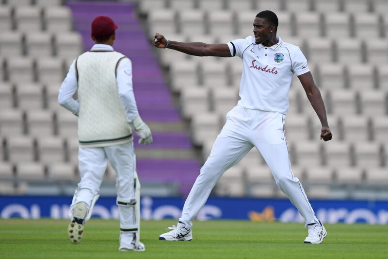 West Indies bowler Jason Holder celebrates taking the wicket of England's Ben Stokes. AFP
