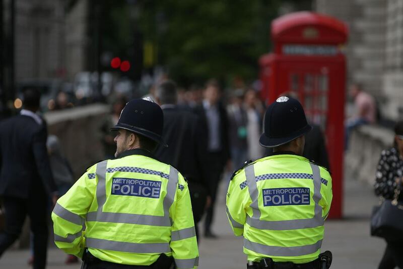 British Metropolitan Police officers standing on duty in central London. Daniel Leal-Olivas / AFP