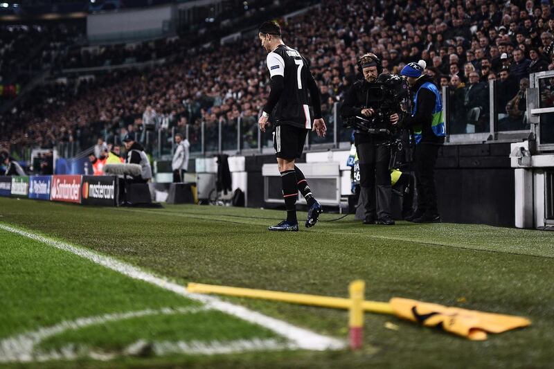 The corner flag pole lies broken after being kicked by Juventus forward Cristiano Ronaldo during the Champions League game. He was limping after the incident. AFP