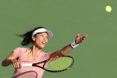 Taiwan's Hsieh Su-wei serves the ball to Czech Republic's  Karolina Pliskova during the WTA Dubai Duty Free Tennis Championship in the Gulf emirate of Dubai on February 18, 2019. / AFP / KARIM SAHIB
