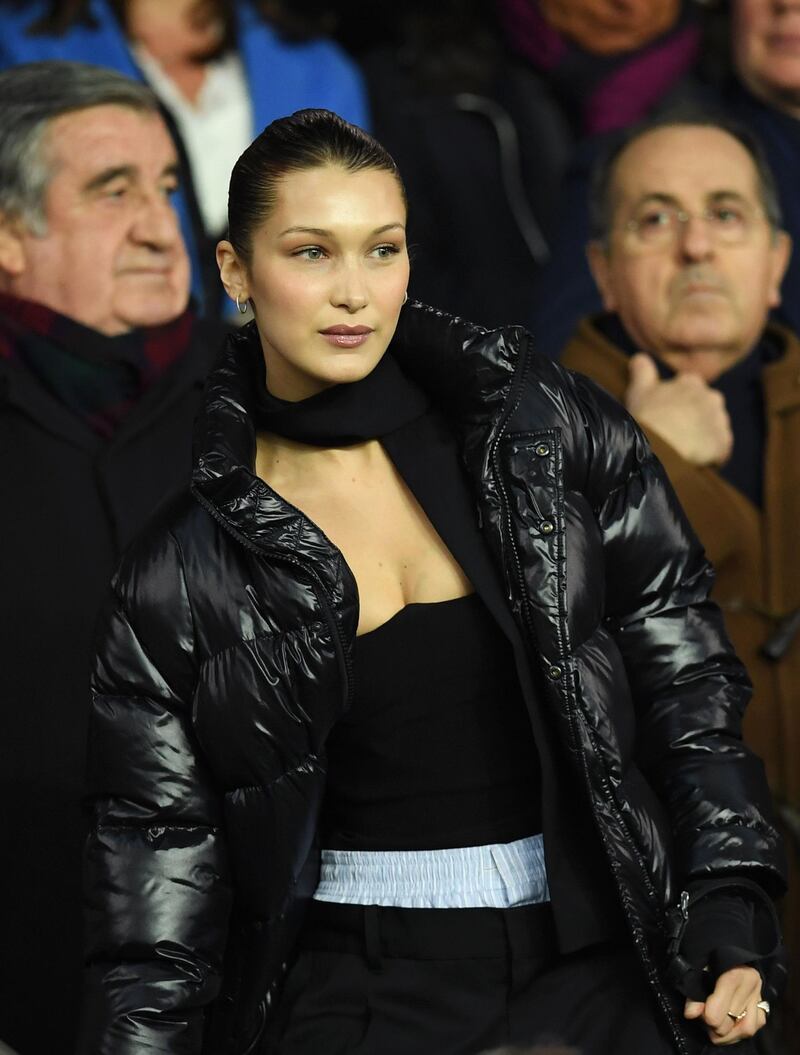 PARIS, FRANCE - MARCH 06:  Model Bella Hadid looks on from the stands prior to the UEFA Champions League Round of 16 Second Leg match between Paris Saint-Germain and Real Madrid at Parc des Princes on March 6, 2018 in Paris, France.  (Photo by Matthias Hangst/Getty Images)