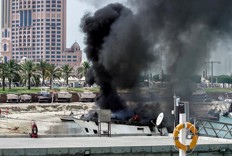 Abu Dhabi, United Arab Emirates, May 19, 2020.    
 A fire breaks out on a boat at the Marina Mall area.
VB / The National
Section:  NA
Reporter:  Haneen Dajani