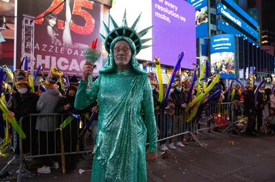 CNN broadcaster Richard Quest dressed up as the Statue of Liberty to celebrate the New Year. Photo: EPA