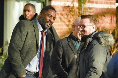 Picture Shows: BTS (Behind the scences). With Producer Derek Ritchie (right), and Writer Neil Cross (centre). DCI John Luther (IDRIS ELBA)