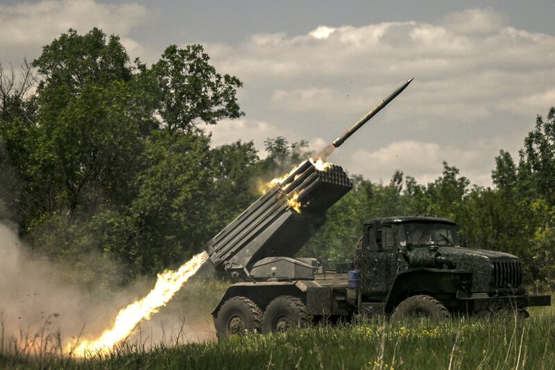 Ukrainian troops fire rockets towards Russian positions at a front line in the Donbas region. AFP