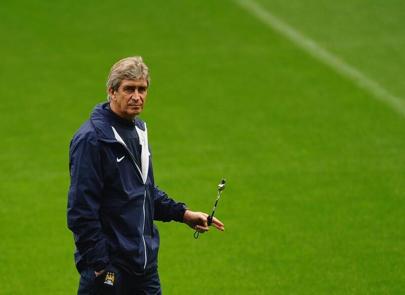 Manuel Pellegrini insists today's game is not about him and Pep Guardiola. Laurence Griffiths / Getty Images