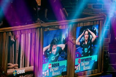 Emil "Nyhrox" Bergquist Pedersen and Thomas "Aqua" Arnould react as they win a match during the Duos competition at the 2019 Fortnite World Cup July 27, 2019 inside of Arthur Ashe Stadium, in New York City. AFP