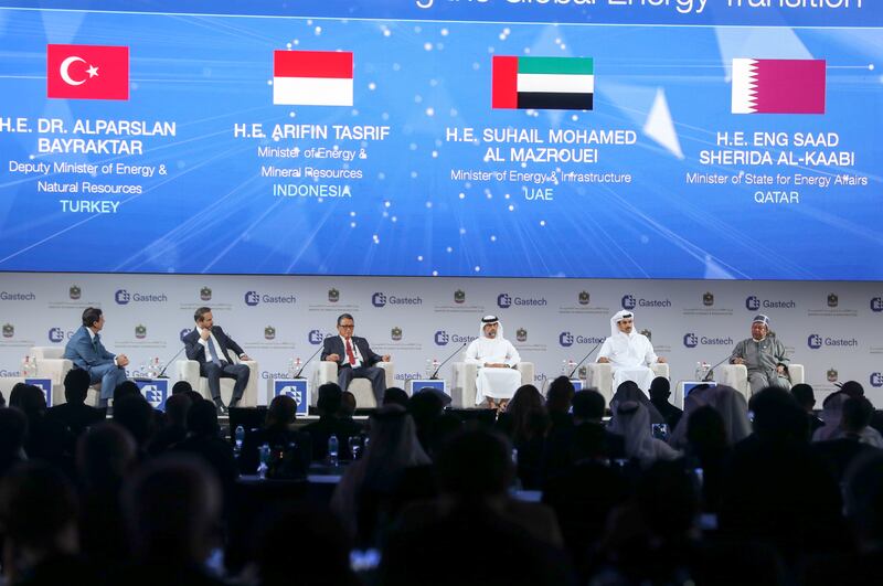 A panel featuring Dr Alparslan Bayraktar, Turkey's deputy minister of energy and natural resources, Arifin Tasrif, minister of energy and mineral resources for Indonesia, Suhail Mohamed Al Mazrouei, UAE minister of energy and infrastructure, Saad Sherida Al-Kaabi, Qatar's minister of state for energy affairs, and Mohammad Barkindo at the GasTech Exhibition and Conference at Dubai World Trade Centre. Khushnum Bhandari / The National
