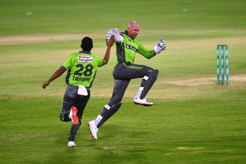Lahore Qalandars wicketkeeper Ben Dunk celebrates after taking the catch of Multan Sultans' Shan Masood during the Pakistan Super League qualifier at the National Stadium in Karachi. AFP