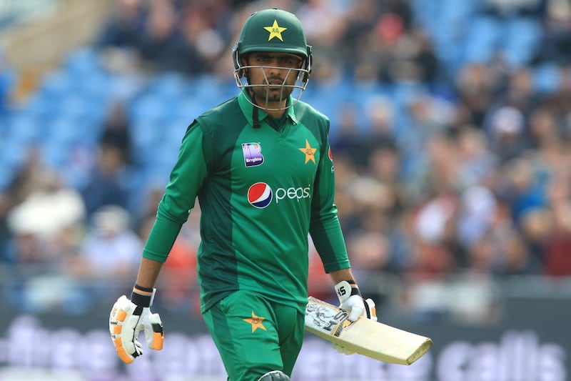Pakistan's Babar Azam walks back to the pavilion after losing his wicket for 80 during the fifth One Day International (ODI) cricket match between England and Pakistan at Headingley in Leeds, northern England on May 19, 2019. - England made 351 for 9 off their 50 overs. (Photo by Lindsey PARNABY / AFP) / RESTRICTED TO EDITORIAL USE. NO ASSOCIATION WITH DIRECT COMPETITOR OF SPONSOR, PARTNER, OR SUPPLIER OF THE ECB
