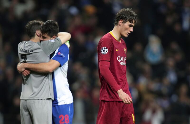 Roma forward Patrik Schick, right, leaves the field as Porto goalkeeper Iker Casillas, left, celebrates with defender Felipe at the end of their Uefa Champions League last-16 second-leg match. Luis Vieira / AP Photo