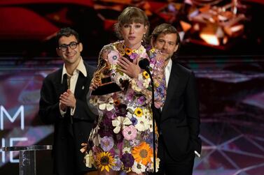 Taylor Swift accepts the award for album of the year for 'Folklore' at the 63rd annual Grammy Awards at the Los Angeles Convention Centre on Sunday, March 14, 2021. AP Photo