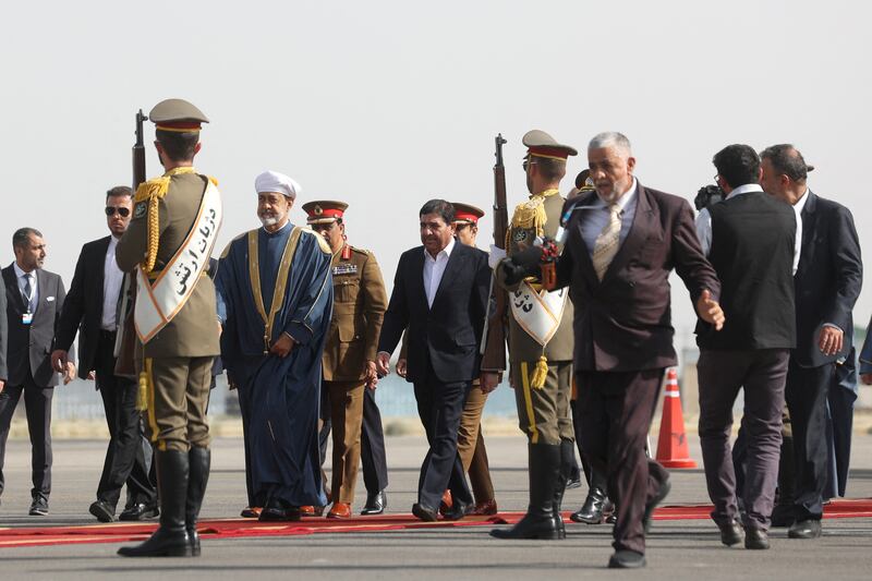 Iran's First Vice President Mohammad Mokhber welcomes Oman's Sultan Haitham bin Tariq upon his arrival at Mehrabad Airport in Tehran. Reuters