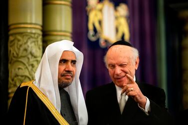 Conscience Foundation President and Founder Rabbi Arthur Schneier (R) and Muslim World League Secretary General Mohammad Abdulkarim Al-Issa speak during an event before signing an agreement calling for the 'protection of religious sites across the world' on April 29, 2019 in the Park East Synagogue in New York City. AFP 