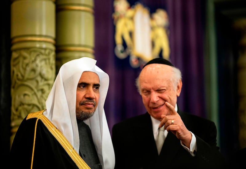 Conscience Foundation President and Founder Rabbi Arthur Schneier (R) and Muslim World League Secretary General Mohammad Abdulkarim Al-Issa speak during an event before signing an agreement calling for the 'protection of religious sites across the world' on April 29, 2019 in the Park East Synagogue in New York City.   / AFP / Johannes EISELE
