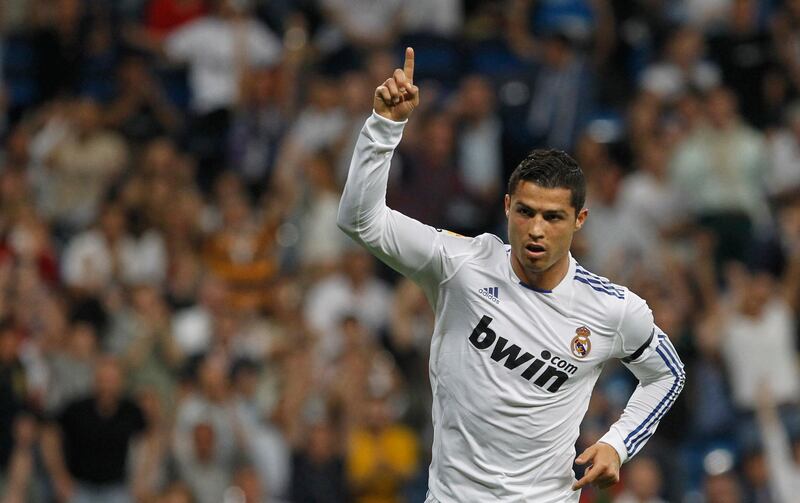 Real Madrid's Cristiano Ronaldo celebrates his goal against Getafe during their Spanish first division soccer match at Santiago Bernabeu stadium in Madrid May 10, 2011. REUTERS/Susana Vera (SPAIN - Tags: SPORT SOCCER IMAGES OF THE DAY)