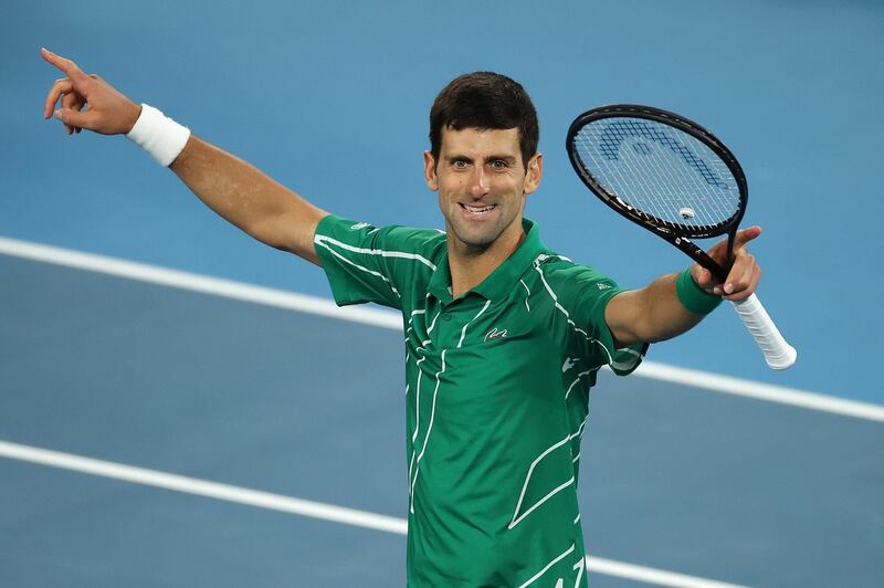 MELBOURNE, AUSTRALIA - FEBRUARY 02: Novak Djokovic of Serbia celebrates winning championship point after his Men's Singles Final against Dominic Thiem of Austria on day fourteen of the 2020 Australian Open at Melbourne Park on February 02, 2020 in Melbourne, Australia. (Photo by Graham Denholm/Getty Images)