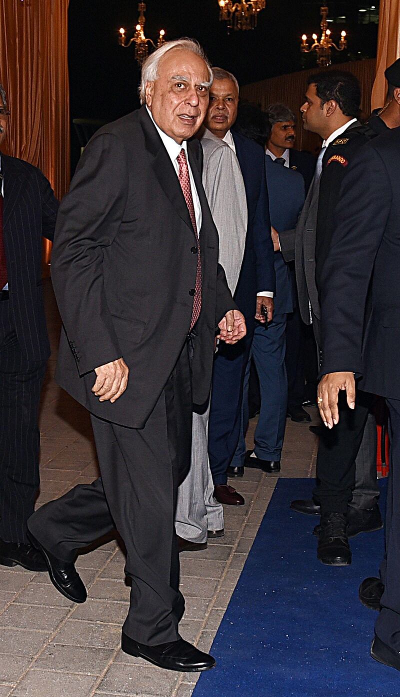 Indian politician Kapil Sibal attends the wedding reception of Isha Ambani. Photo: AFP