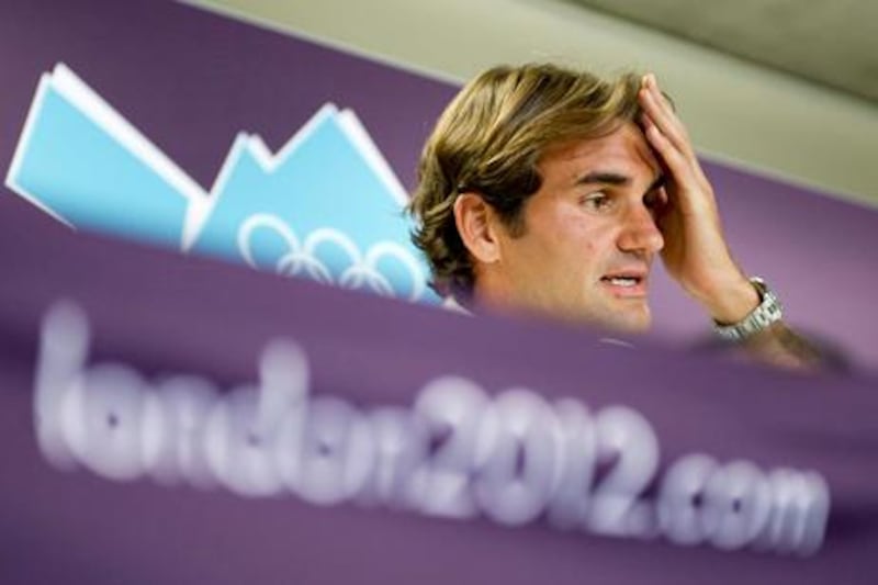 epa03318888 Swiss tennis player Roger Federer during a press conference at the Olympic Park in London, Britain, 26 July 2012 one day before the start of the London 2012 Olympic Games.  EPA/LAURENT GILLIERON