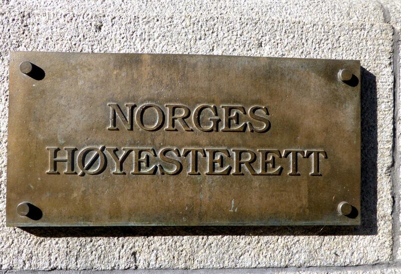 FILE PHOTO: A sign reading Norwegian Supreme Court is seen on the court's building in Oslo, Norway May 23, 2018. REUTERS/Gwladys Fouche/File Photo