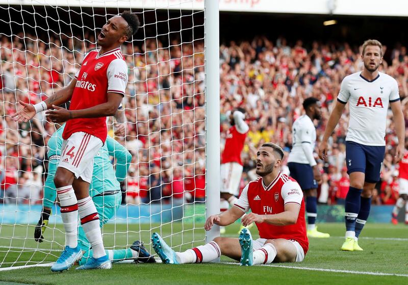 Arsenal's Sead Kolasinac and Pierre-Emerick Aubameyang react after a missed chance. Reuters