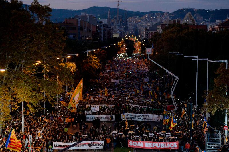 People take part in a demonstration in Barcelona on November 11, 2017 calling for the release of jailed separatist leaders.
Lawmakers opted to split from Spain, claiming they had a mandate after a referendum on October 1 in which 90 percent of voters backed secession. / AFP PHOTO / PAU BARRENA