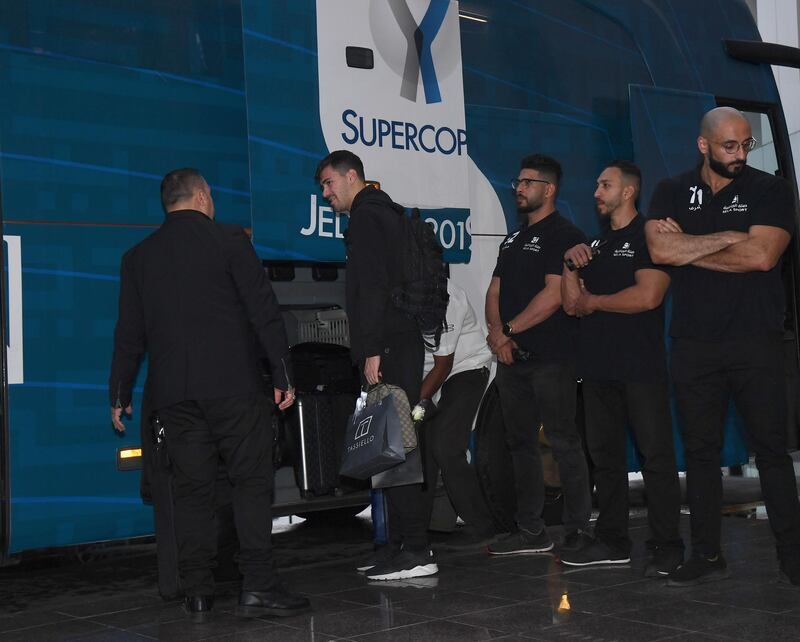 Alessio Romagnoli of AC Milan collects his bag from the team bus in Jeddah. Getty Images